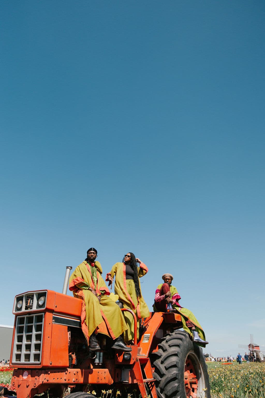 Liquid Lemn editorial — models on tractor in tulip fields